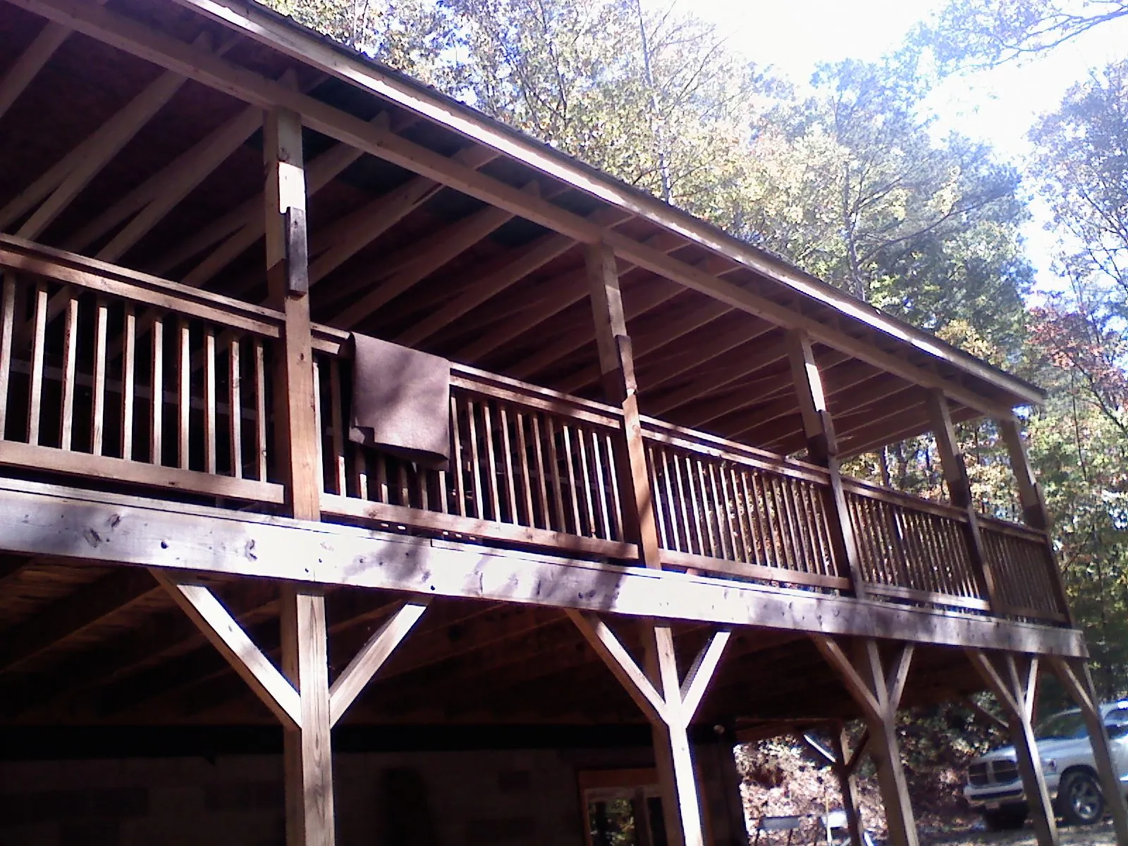 Timber framing under a new elevated porch and deck — Roof Leak Repair in Fort Covington by Roofing Brothers